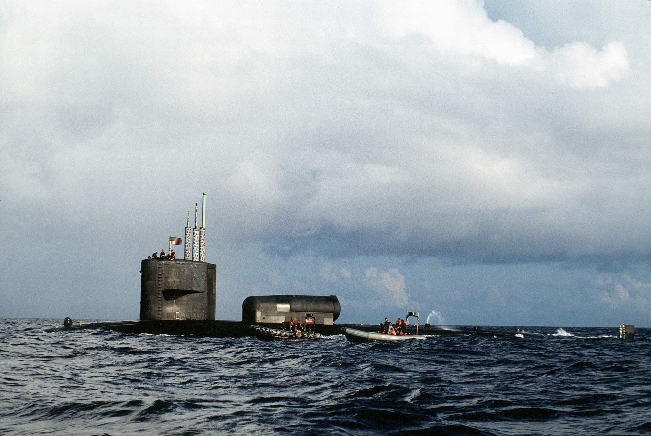 A pair of rigid-hulled inflatable boats operate alongside USS Archerfish (SSN-678) during a 1993 exercise.jpg