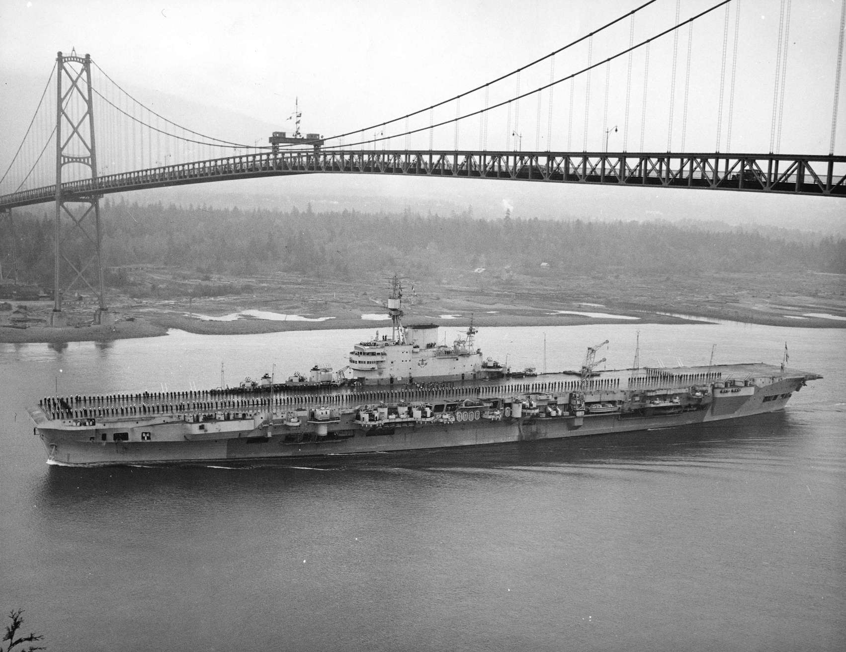 HMS Implacable sails under the Lions Gate Bridge.jpg