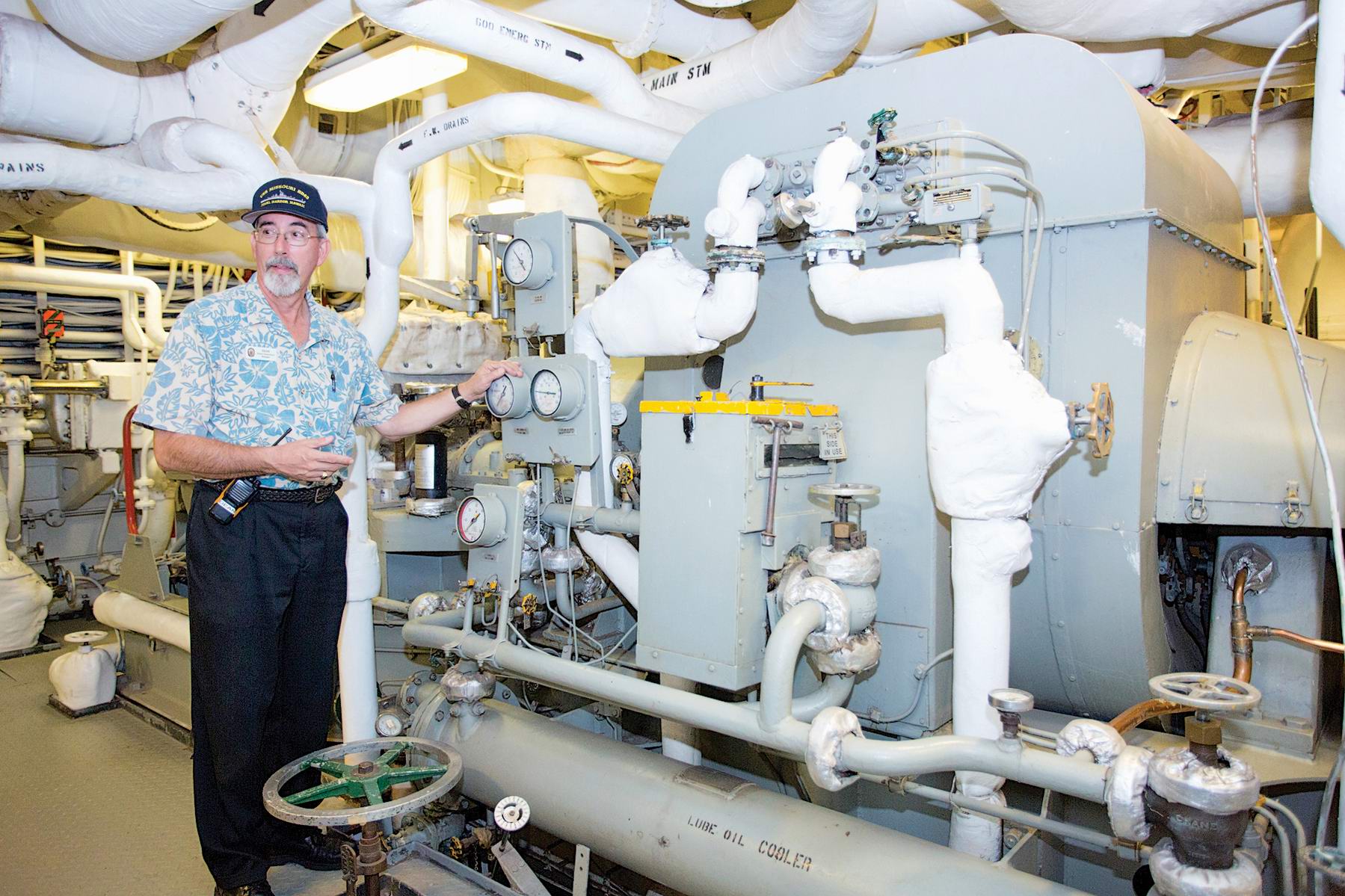 Dean Kelley, visitor experience manager, Battleship Missouri Memorial, and lead tour developer, gives a guided tour of the engine room 4.jpg
