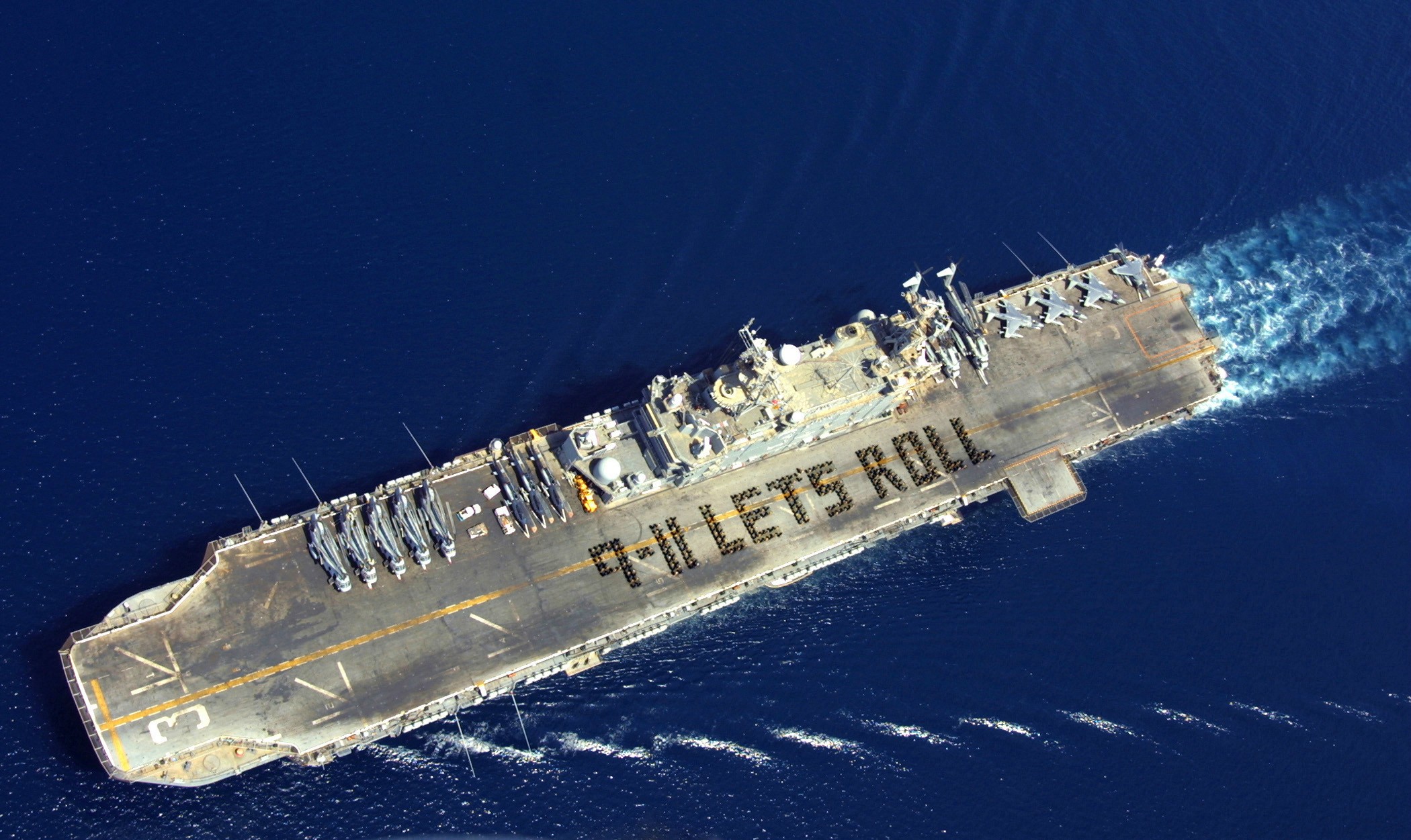 Sailors aboard the U.S.S. Belleau Wood , 9.11.2002.jpg