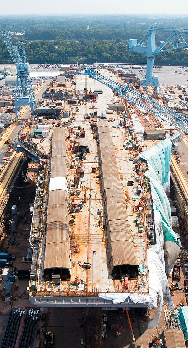 USS George H.W. Bush (CVN-77) rises in Dry Dock 12 at the shipyard. Photo by Adrin Snyder, Daily Press.jpg
