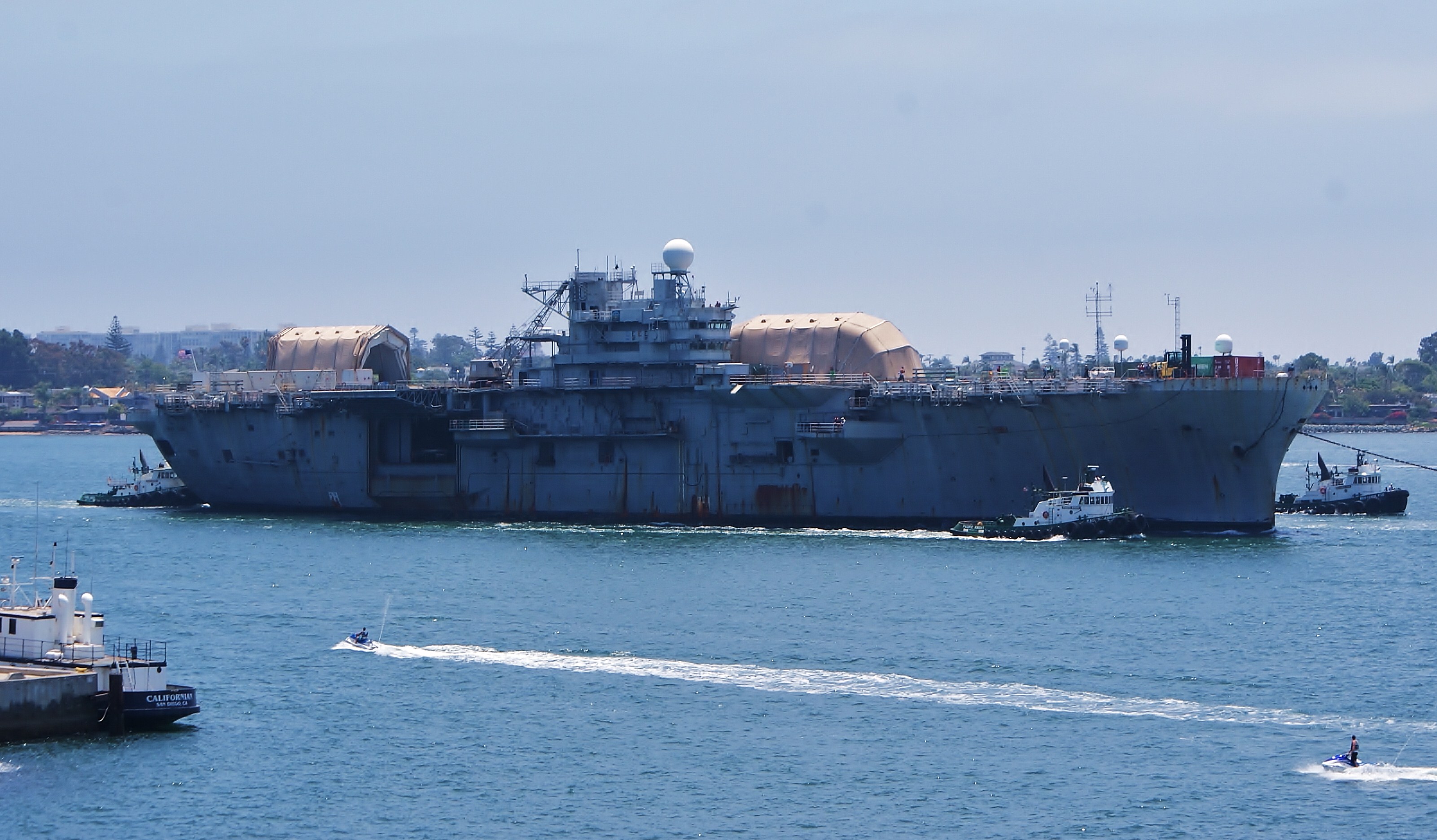USS Tripoli (decommissioned) being towed out of San Diego Bay- 24 July 2010.JPG